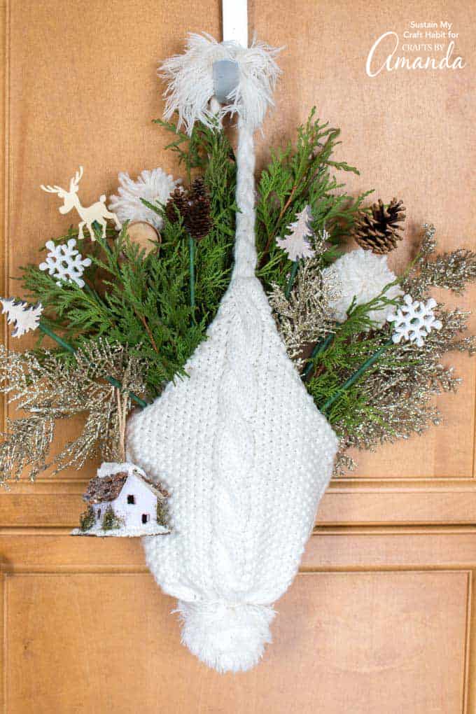 32 Best Winter Craft Ideas for Adults to Try This Season 89 32 Best Winter Craft Ideas for Adults to Try This Season winter crafts winter hat door hanging 1568238131 Winter Craft Ideas for Adults